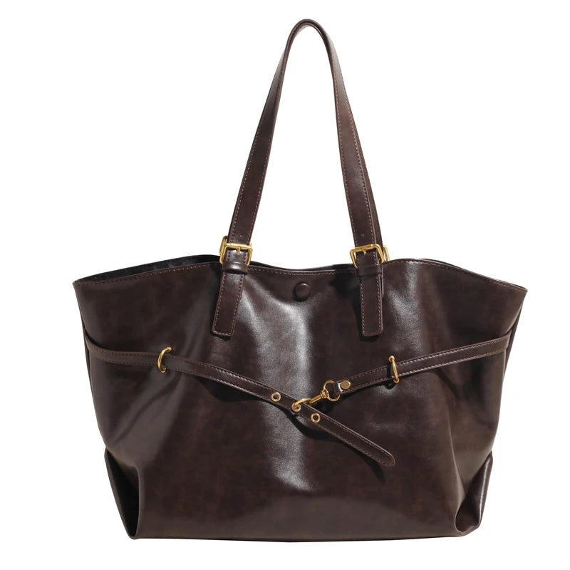 Model wearing retro luxe winter tote with winter coat
