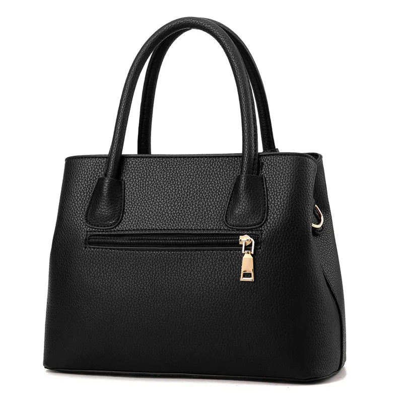 Elegant Everyday Leather Handbag in black with stylish design and zipper details, perfect for any occasion.