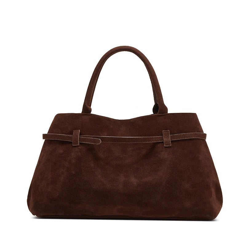 Brown handbag on a white background