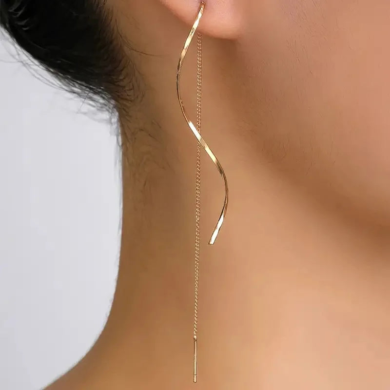 Model wearing Elegant Light Luxury Earrings in gold Elegant Light Luxury Earrings – Minimalist Gold & Silver Styles