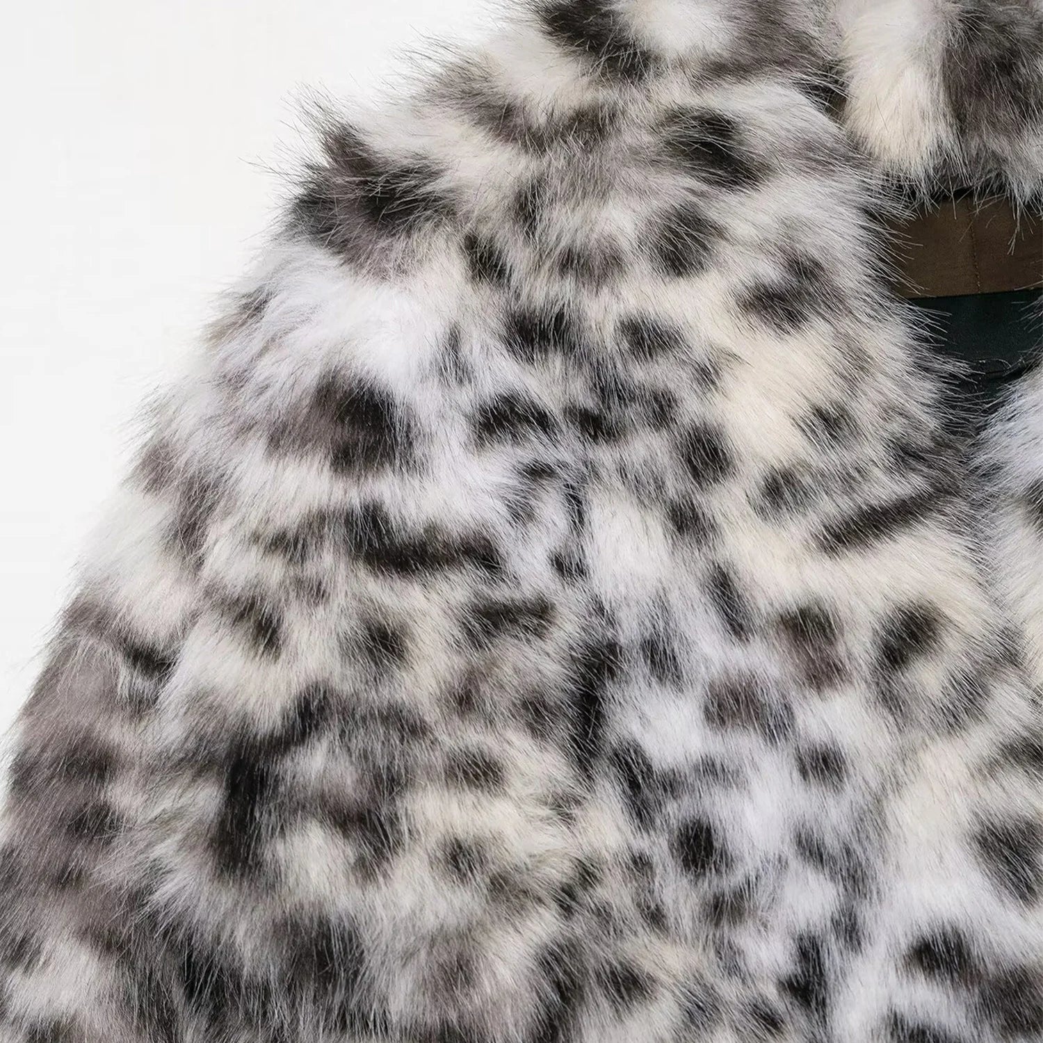 Close-up of a fur surface with black, white, and gray pattern