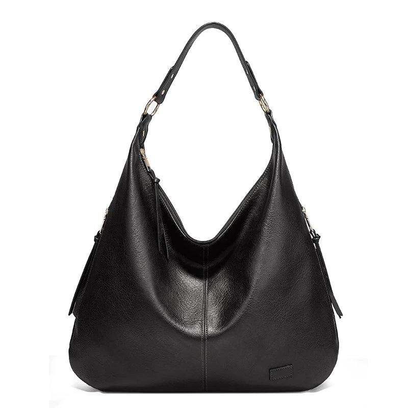 Luxe winter travel handbag in burgundy faux leather