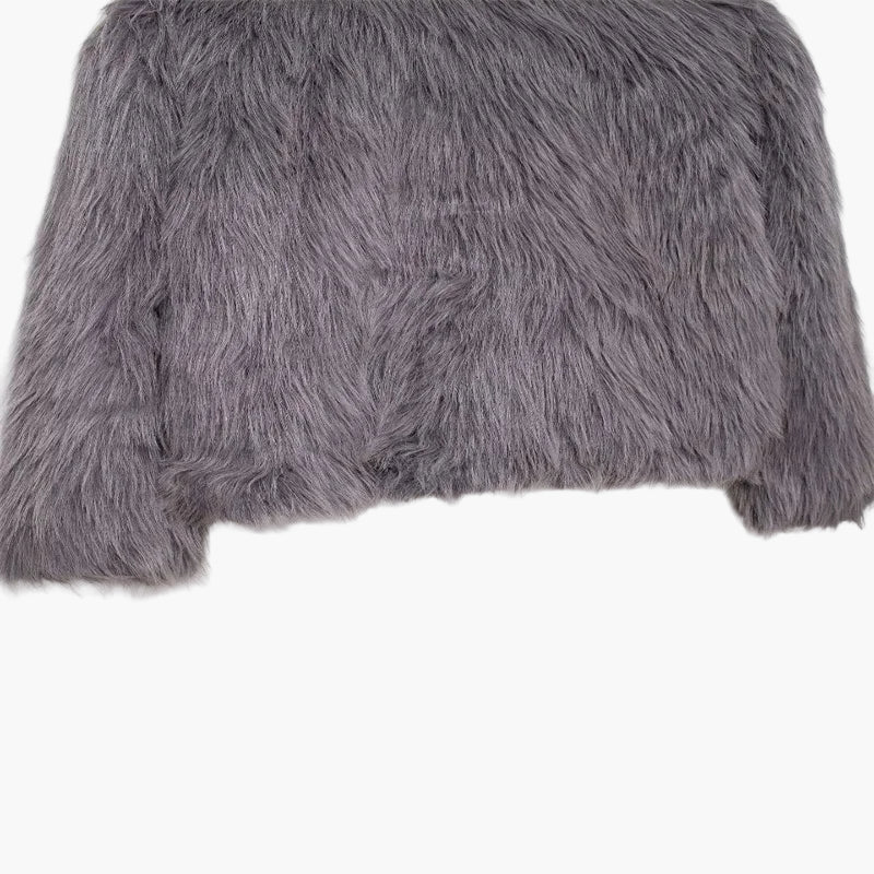 Gray fluffy pillow on a white background