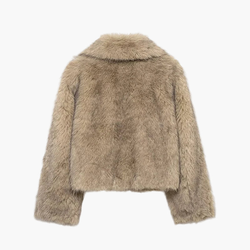 Beige fluffy jacket on a white background