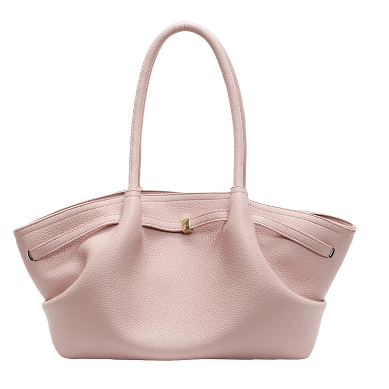 Pink handbag with gold clasp on a white background