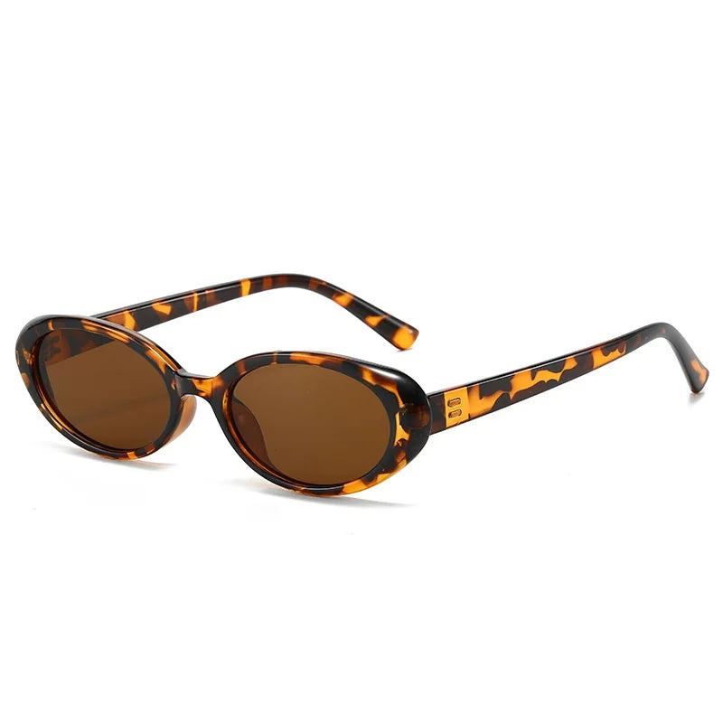 Sunglasses with tortoiseshell fRetro Chic Oval Shadesbrown lenses on a white background