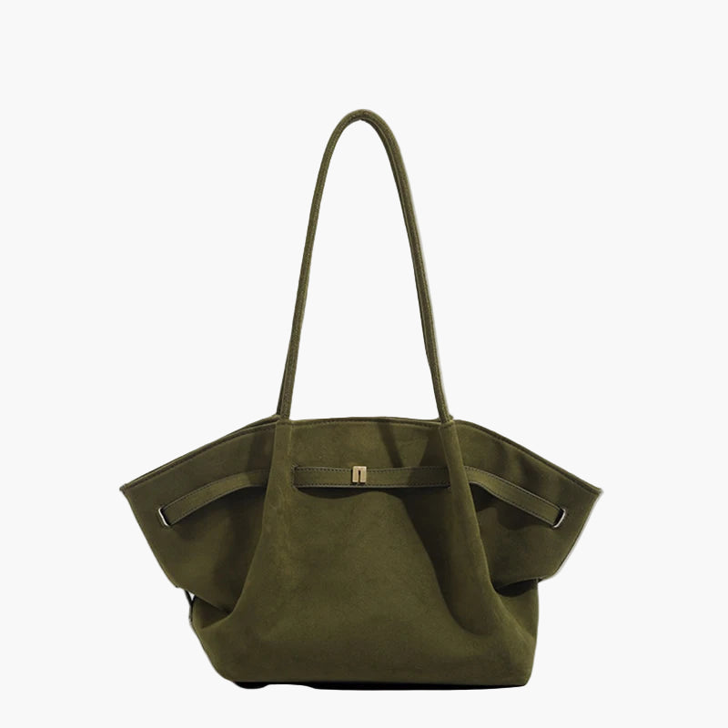 Green handbag on a light gray background