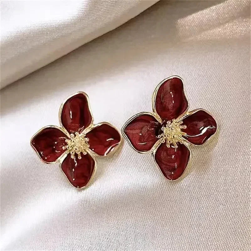 Model wearing Vintage Gold Flower Earrings