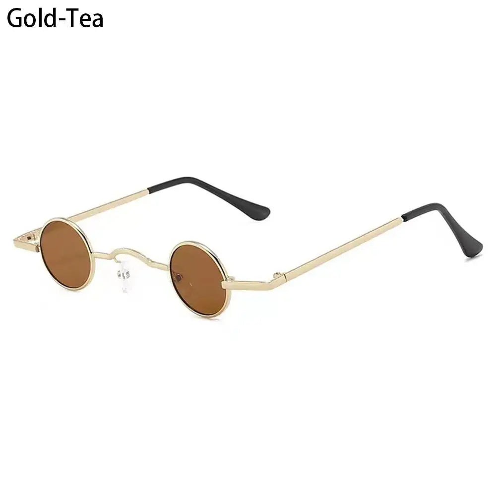 Candy Round Metal Shades, sunglasses with gold frame and black arms on a white background