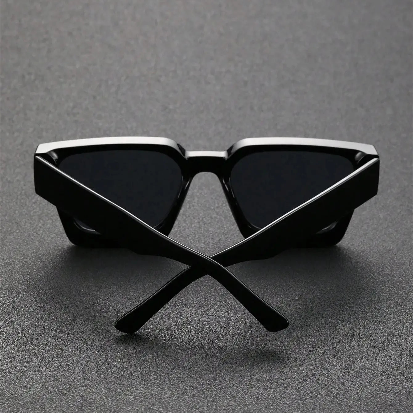 Model wearing Urban Square Street Shades in city setting