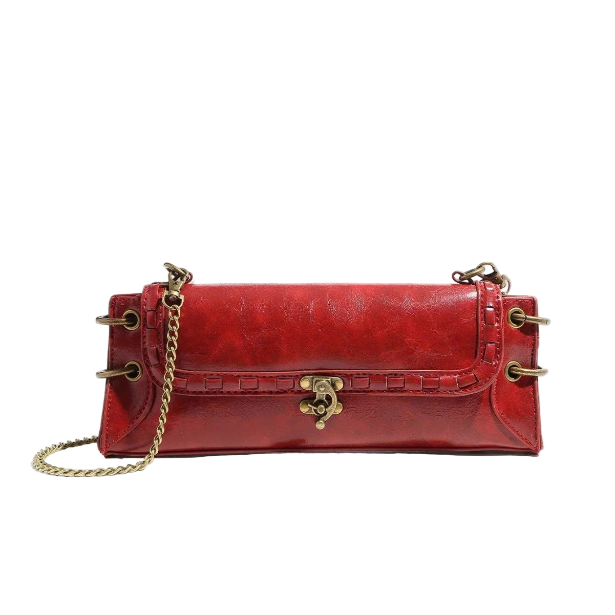 Red handbag with gold chain and clasp on a light gray background