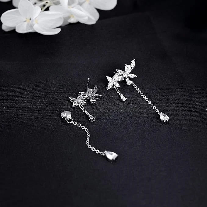 Elegant silver tassel flower earrings showcasing sparkling design and delicate detailing.