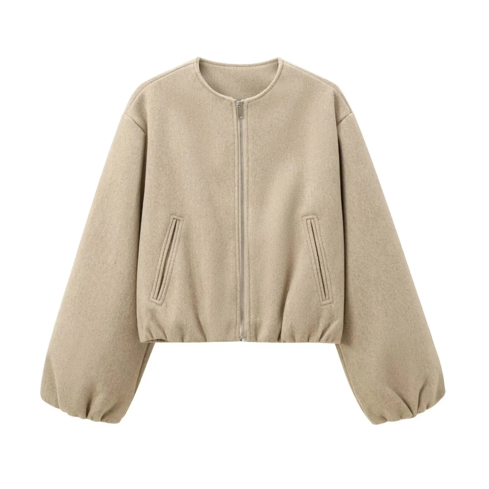 Flat lay of pilot-style jacket with accessories