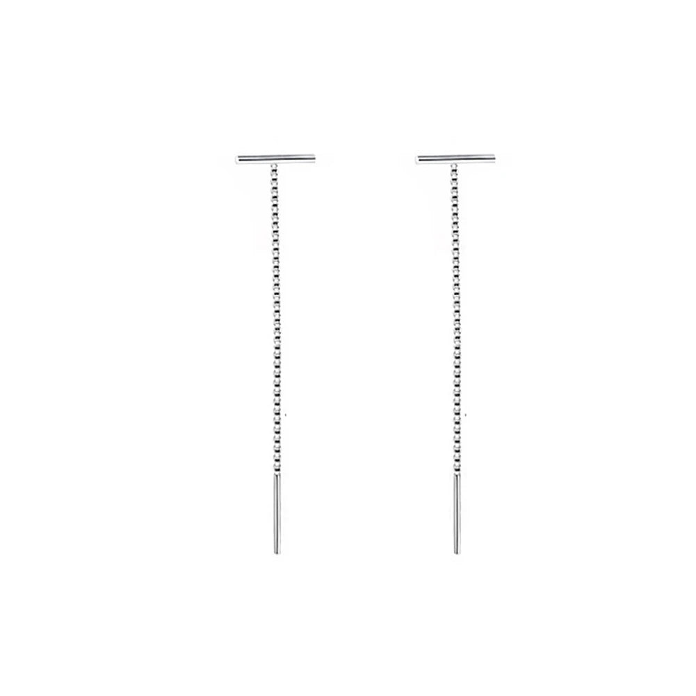 Pair of silver earrings on a white background with Silver Minimalist Tassel Earrings