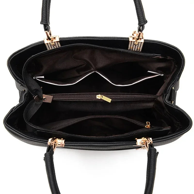 Interior of blossom charm messenger bag showing pockets