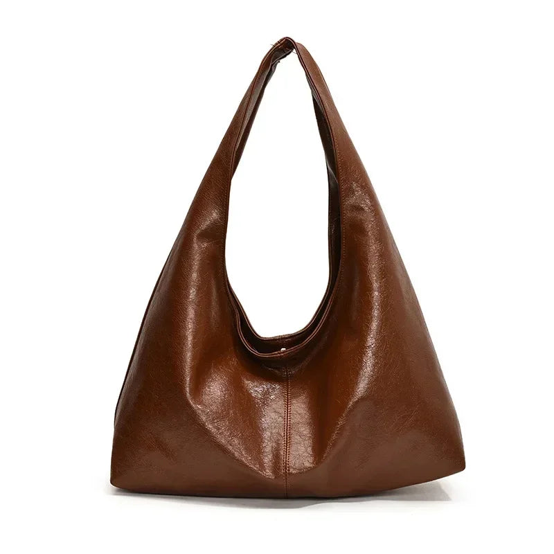 Model wearing Y2K hobo shoulder bag with casual outfit