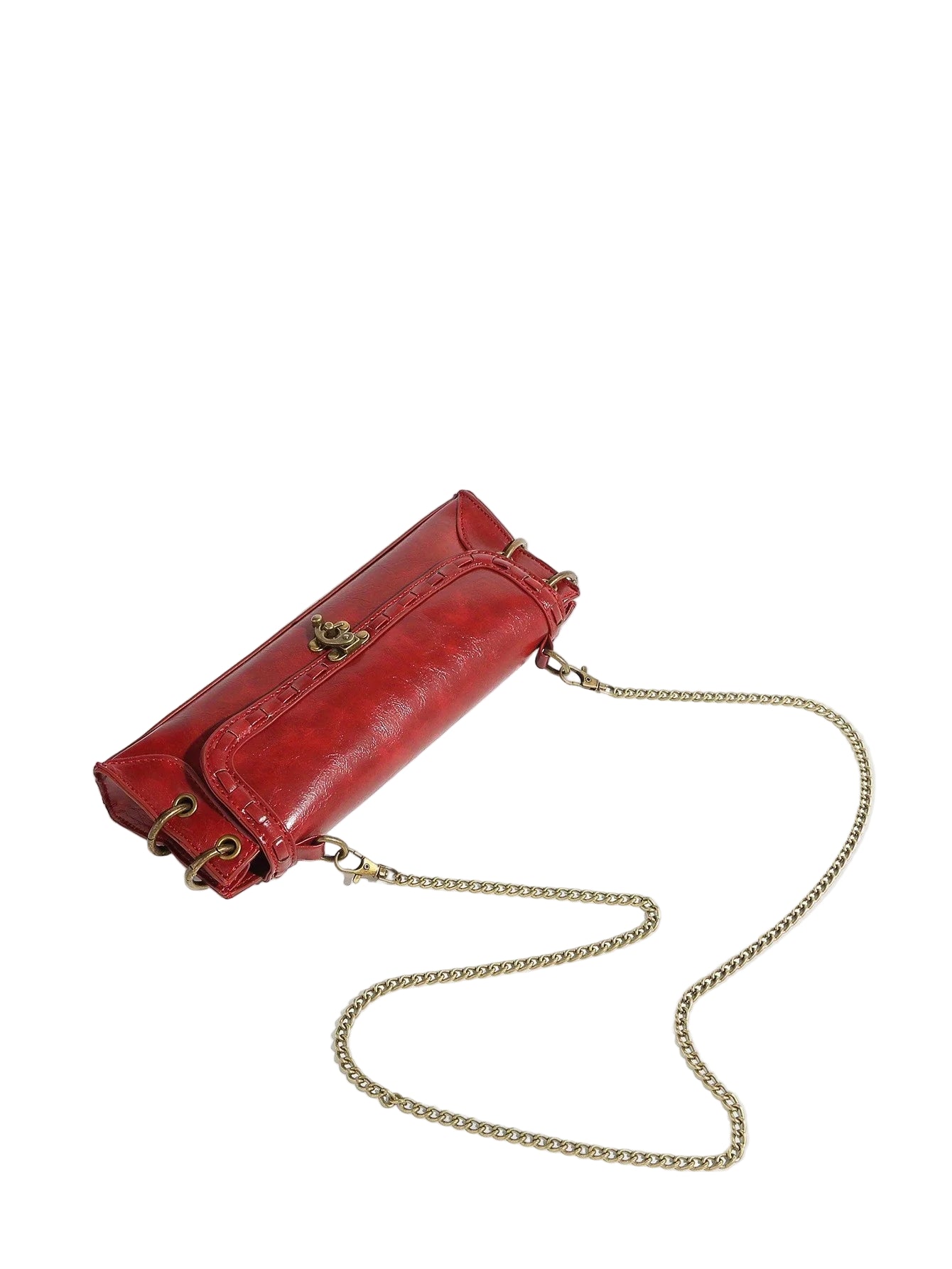 Red leather handbag with a gold chain on a light beige background