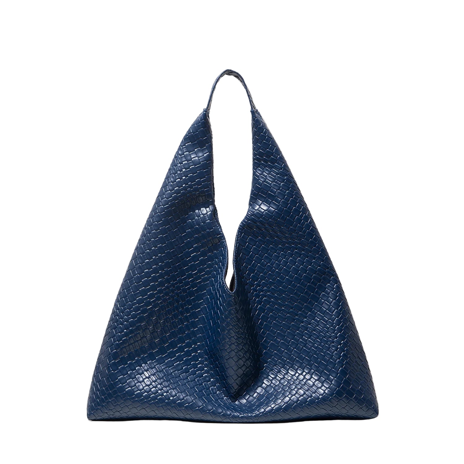 Model holding minimalist retro shoulder tote in beige