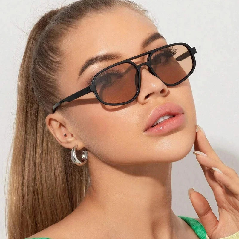 Close-up of Retro Double Bridge Shades on neutral background