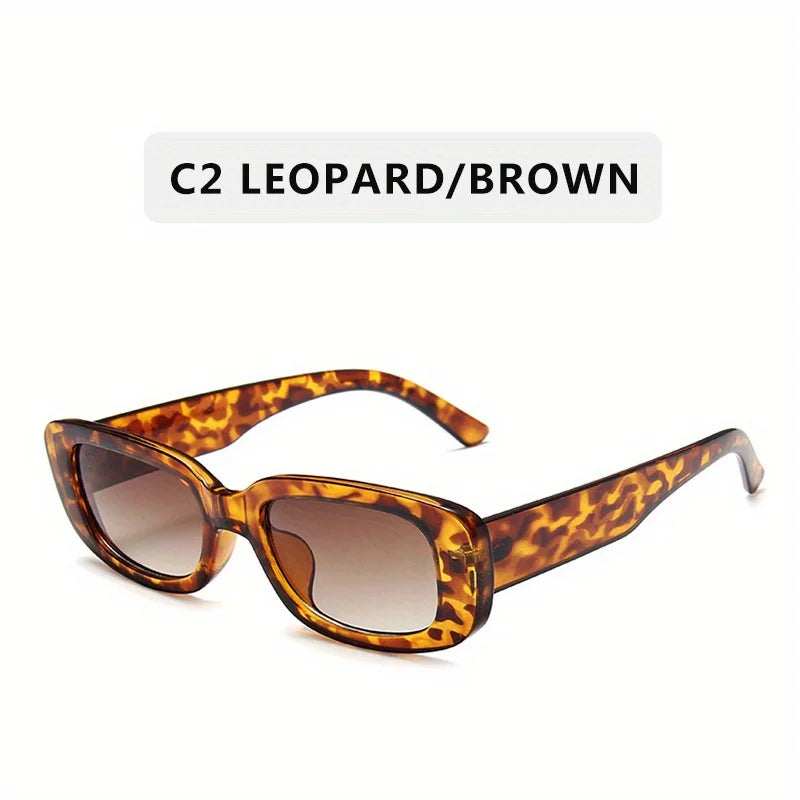 Sunglasses with lVintage Y2K Street Style Eyewearand brown lenses on a white background