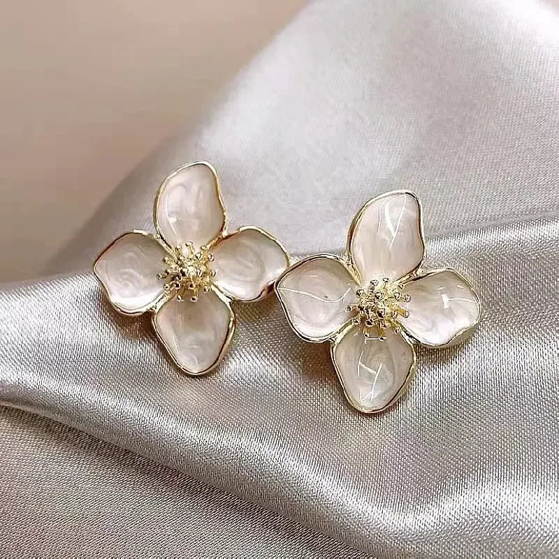 Vintage Gold Flower Earrings on display