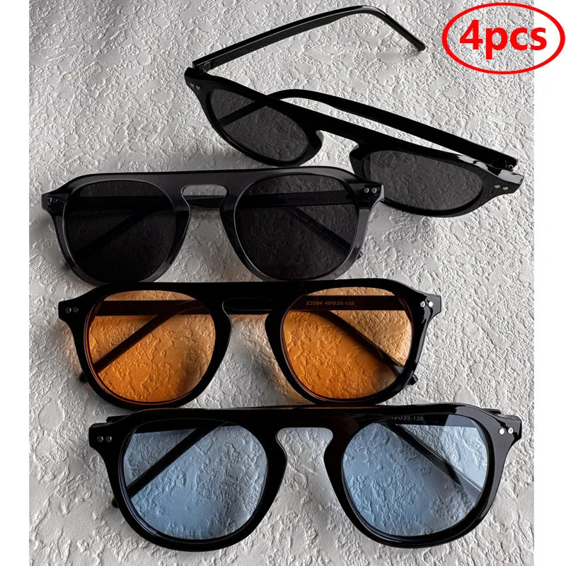 Four pairs of black-framed sunglasses with Steampunk Oval Rivet Shades – Retro Gothic Industrial Goggles
