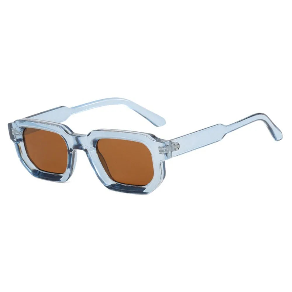Sunglasses with clear frame and brown lenses on Leopard Punk Square Shades