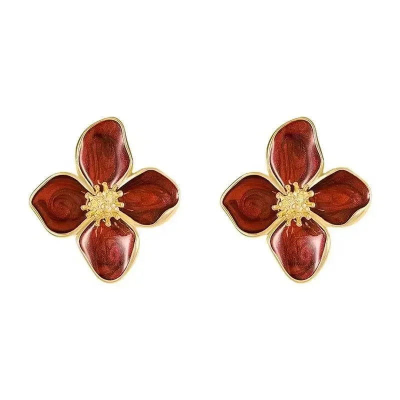 Model wearing Vintage Gold Flower Earrings