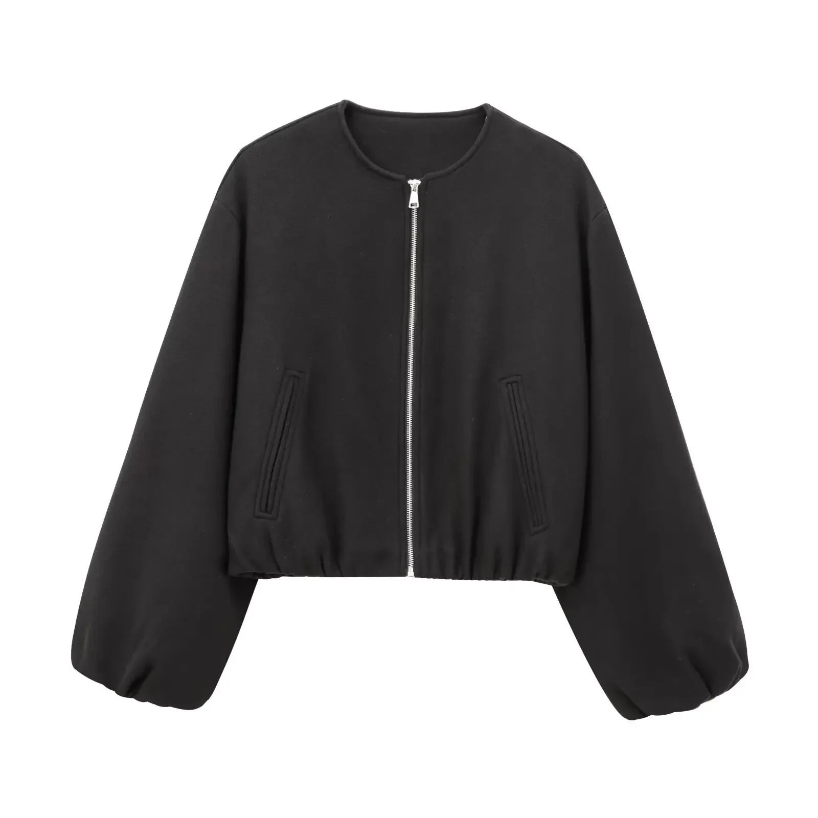 Flat lay of pilot-style jacket with accessories