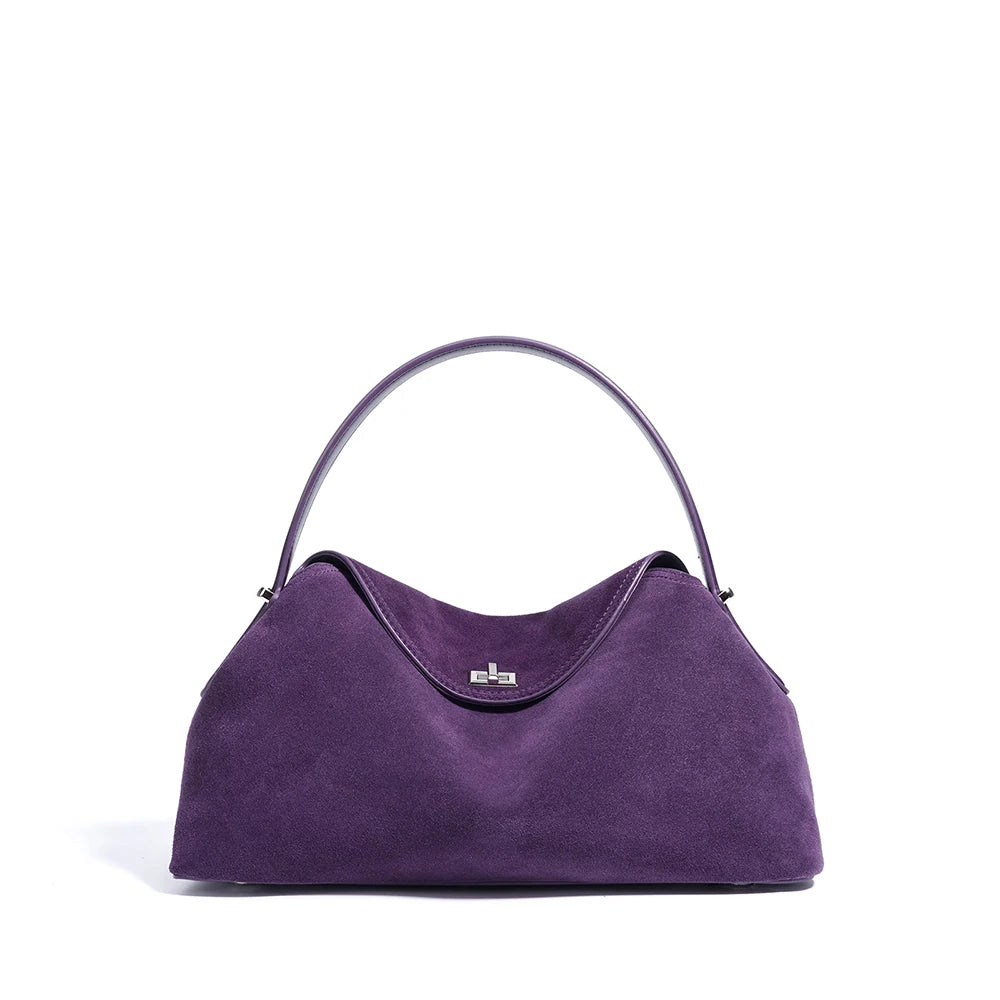 Purple handbag with a handle on a white background