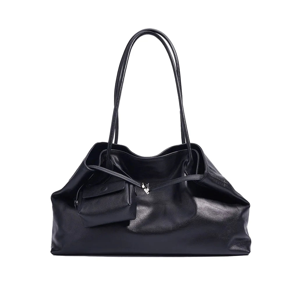 Black leather handbag on a white background